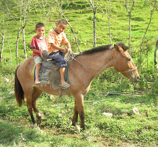 Boys on horse, Yaruca, Honduras