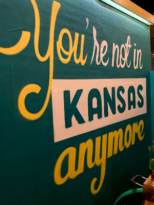 You're Not In Kansas Any More wall sign at Queen of Hoxton rooftop bar