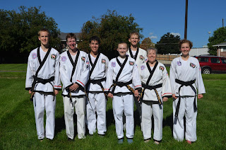 Students of all ages participating in self-defense and a martial arts program