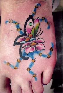 buterfly tattoos design on foot for women