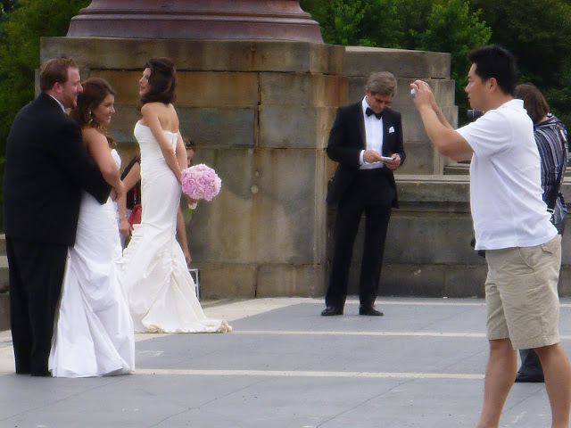 bride and groom posing for photo