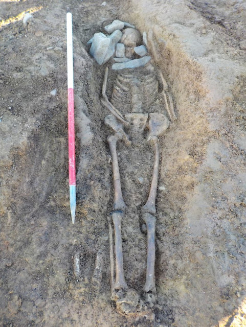 Remains of Roman mercenary and beheaded victim found at ancient site in UK