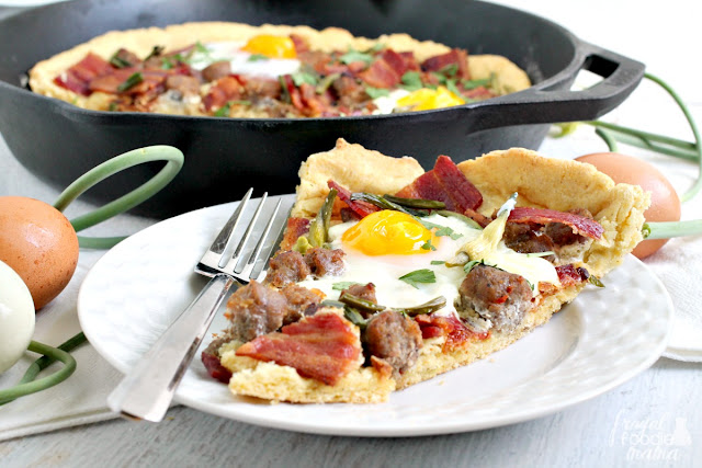 Brimming with bacon, pork sausage, & farm fresh eggs, this hearty Farmers Market Breakfast Pizza is sure to be a crowd-pleaser.