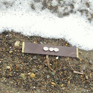 LoveLea's dark chocolate brown leather cuff with Kauri shells