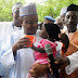 Photo: Governor of Kebbi State pictured deworming a child