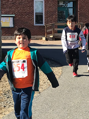 boy smiling at fun run