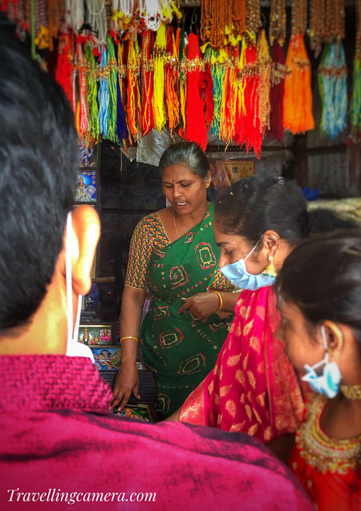 There are several shops near the Srisailam temple that offer a range of items, including souvenirs, religious items, and local handicrafts. Some of the popular shops near the temple are:  Srisailam Handloom Emporium: This shop offers a range of traditional handloom textiles, including sarees, dhotis, and shawls, all made using local techniques and materials. Visitors can also find a range of handicrafts and souvenirs at the shop.