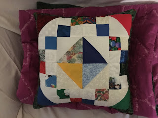 Matching Holiday-themed pillow for Inclusive Indiana Foundation