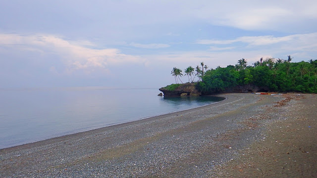 beach and sea view, right side of Kuting Reef Resort and Spa in Macrohon Southern Leyte