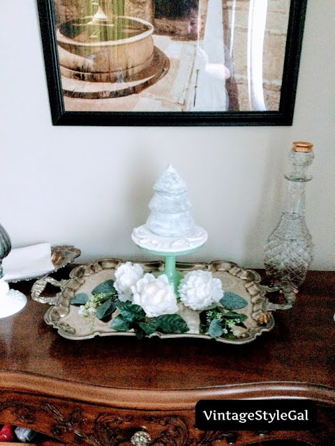 Glass tree covered in epsom salt on cake stand