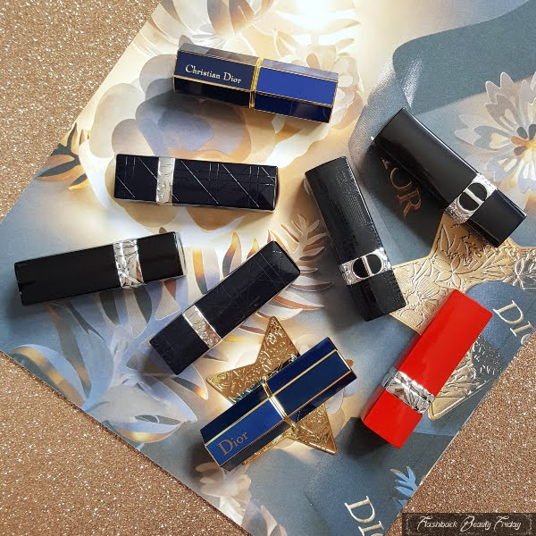 selection of current and old Rouge Dior lipsticks in various cases