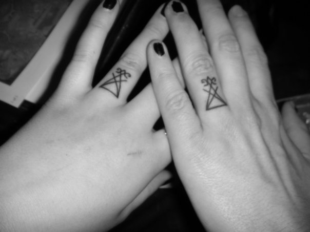 wedding ring tattoos. wedding ring tattoo designs