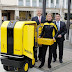 Postbodes Deutsche Post op pad met robot