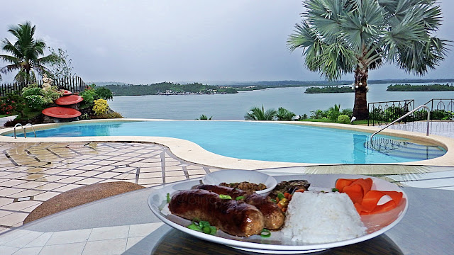 food with the pool and the sea as background at Pasqualino's Ristorante Italiano in Sta. Rita, Samar