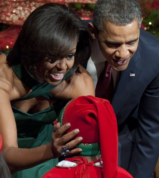 President Obama and First Lady Michelle O greeted children dressed as elves 