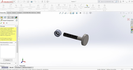 Inserting nut and bolt in the assembly file