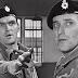 STANLEY BAKER AND TOM BELL SNEAK THROUGH 'A PRIZE OF ARMS' 