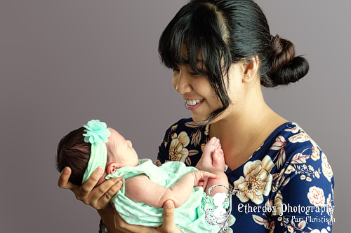 Professional portrait of a newborn baby and her family Albuquerque