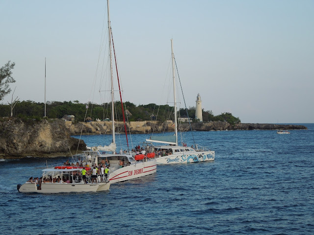 lighthouse and boats at Rick's Cafe