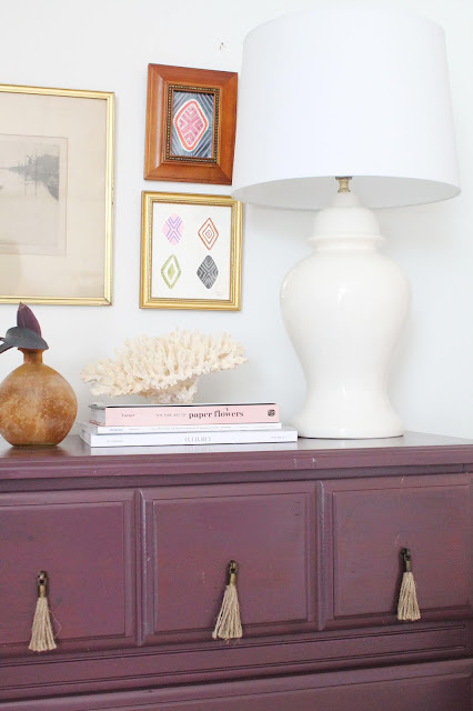 luxe purple dresser with tassel and brass pulls
