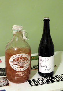 White wine vinegar about to start, malt (beer) vinegar a year into the process.