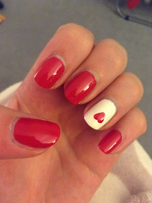 Red nails, and one special design on a special nail