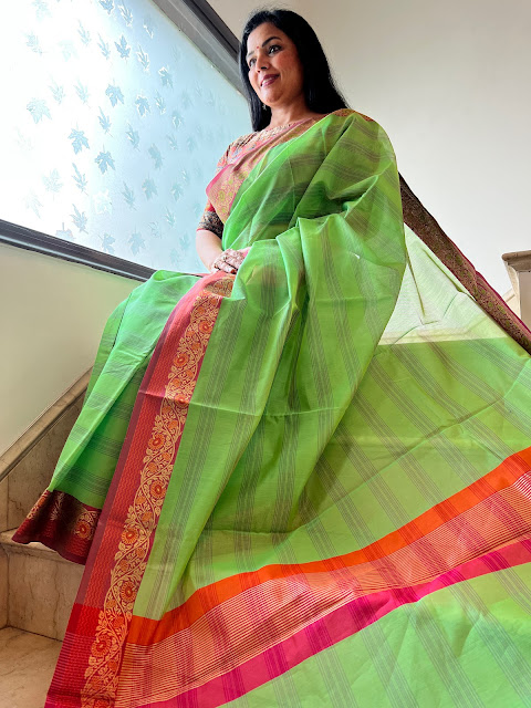 Harmony of Contrasts: Exploring the Timeless Beauty of Green Cotton Saree with Red Border
