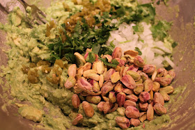 Pistachio, onion, pickled jalapeño and cilantro added to mashed avocado and lime
