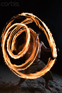 Man Juggling Fire - Roy McMahon/zefa/Corbis