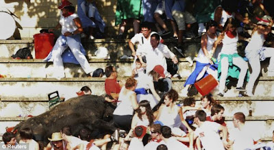 Man in a red England shirt get Weird Bull attack face to face Seen  On www.coolpicturegallery.net