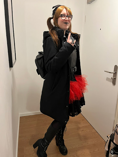 trying to cover the outfit with a coat