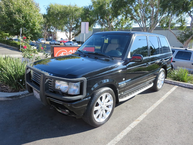 Range Rover after complete paint job at Almost Everything Auto Body.