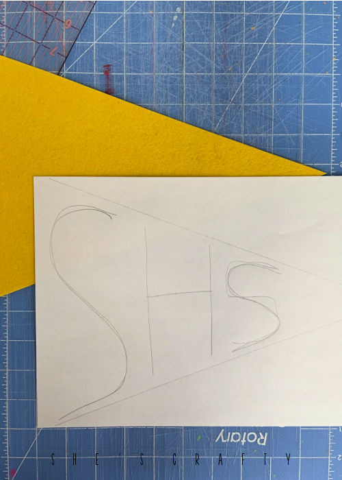 back to school felt flags - make a stencil on paper.