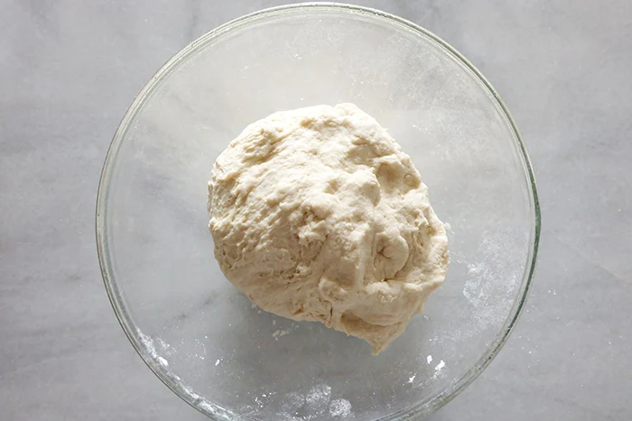 Italian bread dough in bowl ready for rise