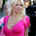Paparazzi boo Pamela Anderson at Cannes