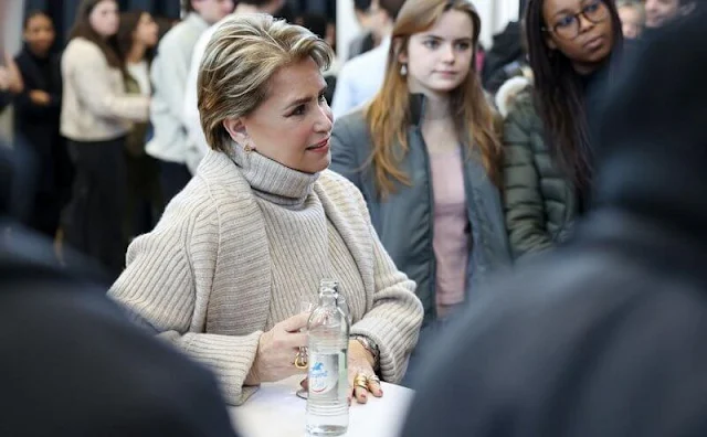 Grand Duchess Maria Teresa wore a wool and cashmere cardigan and sleeveless sweater by Barbara Bui. Joseph Ade midi skirt