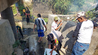 HUT Brimob Polri Peduli, Personil Bersihkan Sampah Aliran Sungai Karanggelam Cikampek Timur 