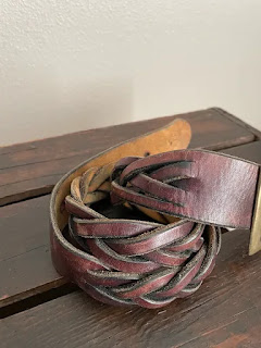 The braided detail of a vintage belt