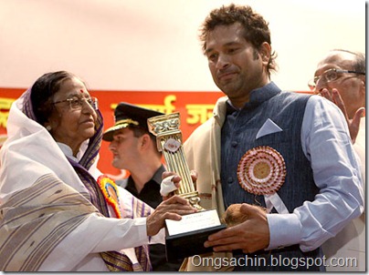 President Pratibha Patil felicitates cricketer Sachin Tendulkar during a function to celebrate the golden jubilee of Maharashtra's Foundation Day in New Delhi.