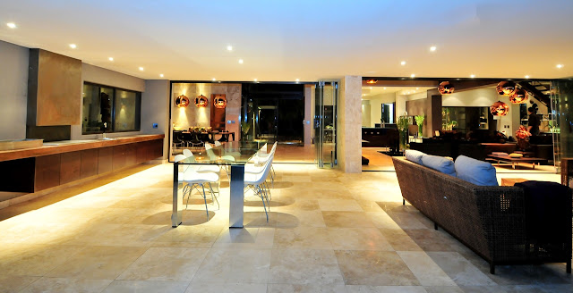 Picture of large glassy dining table on the terrace