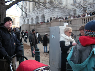 Keith in front of the Rayburn House Office Building, across from the Capitol. Aria's in the stroller, asleep.