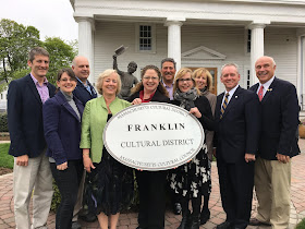  from left:Franklin Deputy Town Administrator Jamie Hellen, FCD Committee member Stacey David, Franklin Town Councilman Robert Dellorco,  FCD Committee member Nancy Schoen, Senator Becca Rausch, FCD Committee member John LoPresti, MCC Executive Director Anita Walker, FCD Committee member Pandora Carlucci, Representative Jeff Roy, Franklin Town Council Chair Tom Mercer 