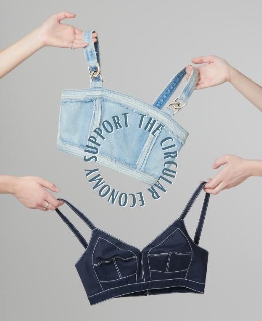 Image of two denim bralettes againt grey backdrop, they are held up above one another with text overalyed in a circle reading Support The Circular Economy