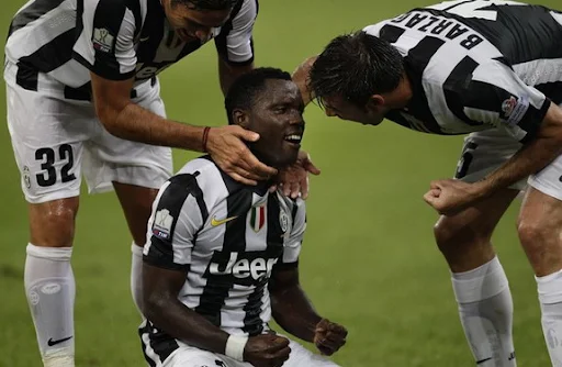 Kwadwo Asamoah celebrates after scoring against Napoli with Juventus teammates