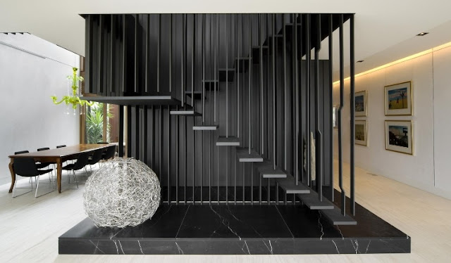 Thin black stairs 