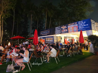 Families and friends enjoying the food and music at Singapore F1 race carnival 2015 