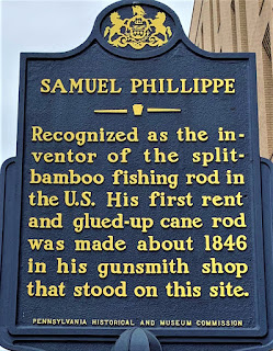 Samuel Phillippe. Recognized as the inventor of the split-bamboo fishing rod in the U.S. His first rent and glued-up cane rod was made about 1846 in his gunsmith shop that stood on this site.