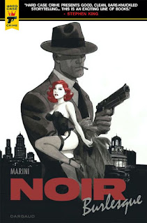 Cover for "Noir Burlesque" by Enrico Marini. A red-headed woman wearing a black corset and stockings poses. Behind her, the figure of a man wearing a hat and holding a pistol. Behind him, the skyline of a US city.