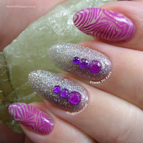 Purple zebra print negative space stamping nail art over holographic glitter base.
