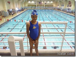 Annalise poses in front of the pool